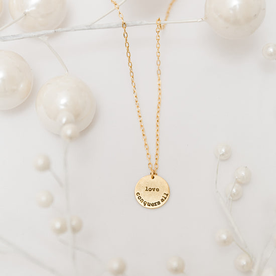 December "Love Conquers All" Necklace