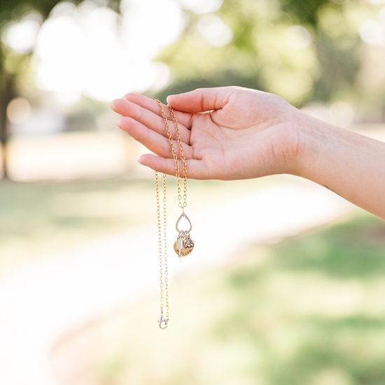 September "He Pursues" Necklace